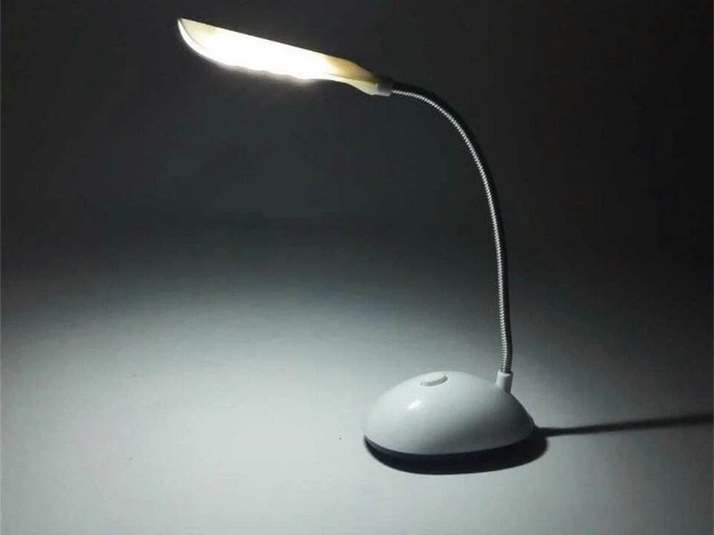 Battery-powered LED moving table lamp 3 { "alt_text": "Battery-powered LED lamp with movable neck" }