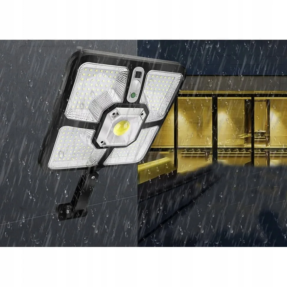 a light on a wall in the rain