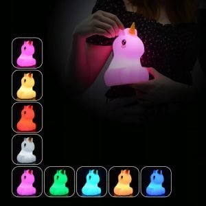 a woman holding a toy