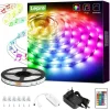 Svetleč RGB LED trak navit na kolutu z daljinskim upravljalnikom ob strani