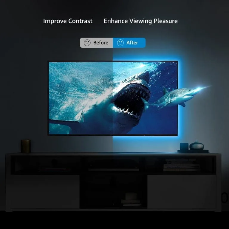 TV LED şerit RGB 4x 50cm USB 6 Televizyonun arkasına monte edilmiş RGB LED şeritler mor ve mavi renkte parlıyor.