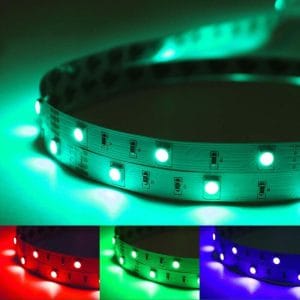 Two rolls of RGB LED strip lights with a remote control and power adapter